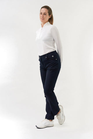 Navy Ladies golf trousers made from flexible lightweight 4 way stretch material.  Featuring a zip and button fastening with five belt loops, a regular fit with anti-crease and anti-static properties. These women's golf trousers have two open pockets to the front and back. Size 8 to 20.
