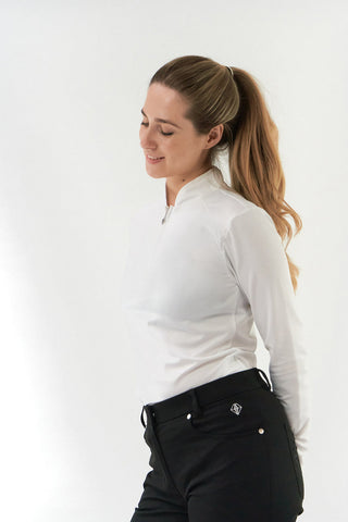 Black ladies golf trousers made from flexible lightweight 4 way stretch material.  Featuring a zip and button fastening with five belt loops, a regular fit with anti-crease and anti-static properties. These women's golf trousers have two open pockets to the front and back. Size 8 to 20.
