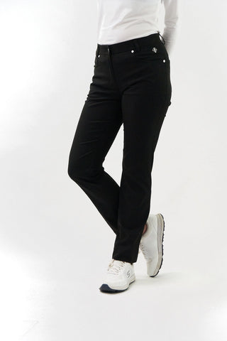 Black ladies golf trousers made from flexible lightweight 4 way stretch material.  Featuring a zip and button fastening with five belt loops, a regular fit with anti-crease and anti-static properties. These women's golf trousers have two open pockets to the front and back. Size 8 to 20.