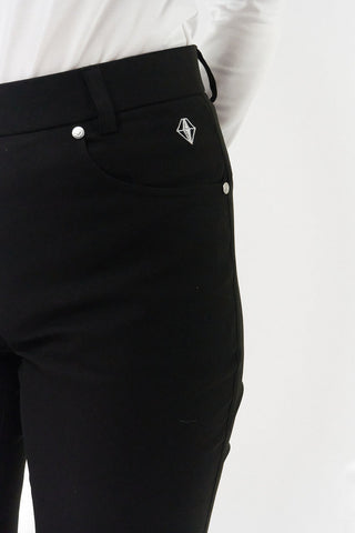 Ladies golf trousers made from flexible lightweight 4 way stretch material.  Featuring a zip and button fastening with five belt loops, a regular fit with anti-crease and anti-static properties. These women's golf trousers have two open pockets to the front and back. Size 8 to 20.