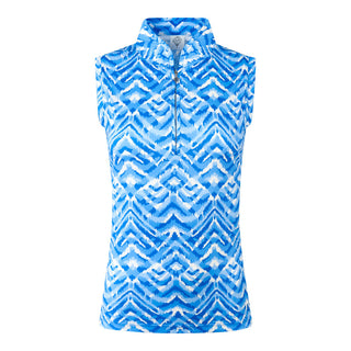 The Pure Golf product shot of the Rise Santorini Skies sleeveless ladies' golf polo shirt. Featuring a mesmerizing Ikat-inspired design in blues and white. With a regular fit and 4-way stretch, it ensures comfort and a flattering shape for all body types. The mandarin collar adds a touch of elegance. Crafted from 95% polyester and 5% spandex, it offers anti-crease, anti-static, and quick-dry properties, along with UPF 50+ sun protection. 
