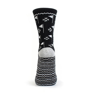 Ladies Black Crew Golf Sock has a trendy golf flag design with lurex stripe detailing on the sole. Made from a soft, stretchy cotton blend fabric allowing breathability, with a cushioned sole, compression fit and Rib cuff for a snug fit. They are suited to UK sizes between 4 and 7. 85% Cotton, 13% Polyester, 2% Elastane.